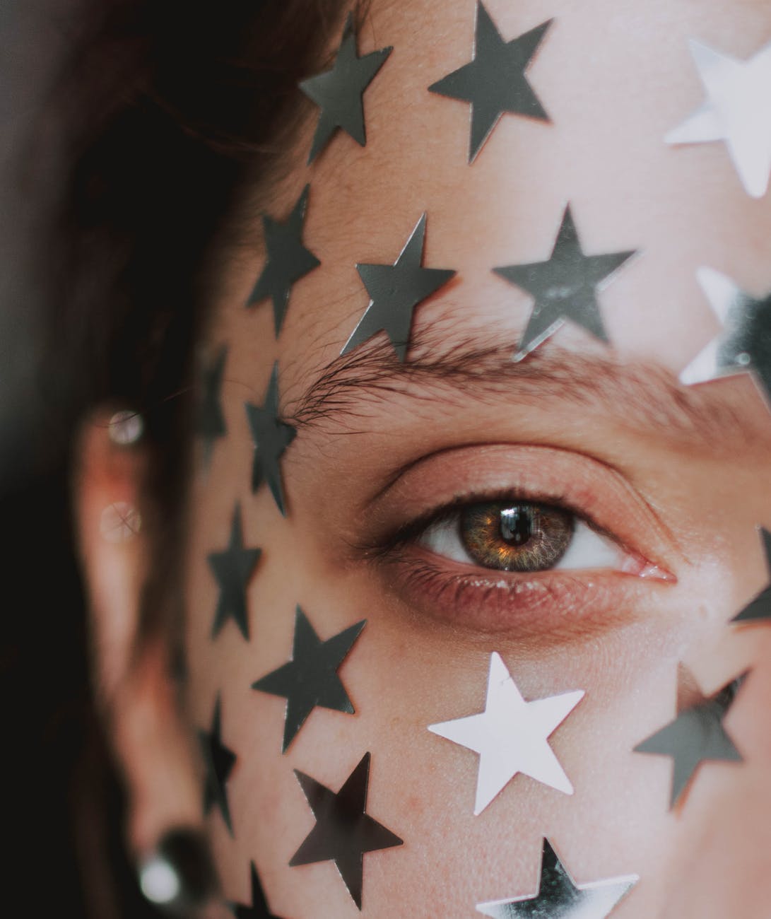 woman with star on face